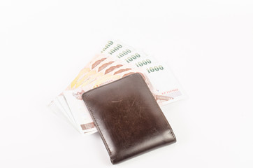 thai banknote in wallet on white background