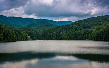 Storm clouds and mountains reflecting in Unicoi Lake, at Unicoi