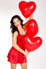Sexy brunette with balloons heart