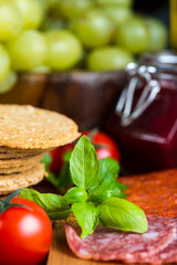fresh organic tomatoes with basil and rock salt