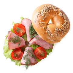 bagel with ham and vegetables isolated top view