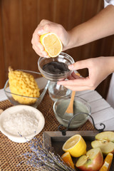 Beautician makes cosmetic facial masks, close-up,