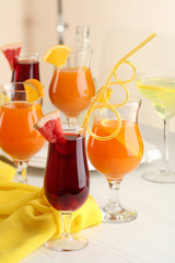 Glasses of fruit cocktails in party close-up