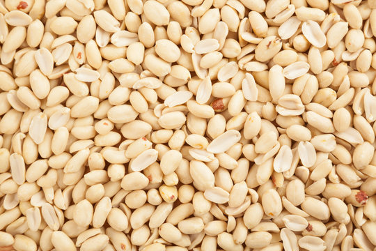 Peeled peanuts as background , texture