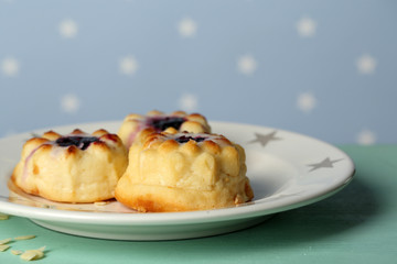 Delicious cheesecake on table, on color background