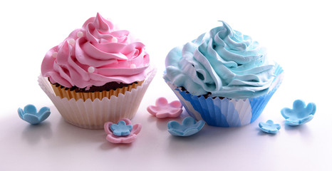 Delicious cupcakes isolated on white