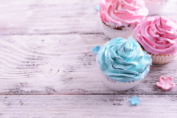 Obraz na płótnie Canvas Delicious cupcakes on table close-up