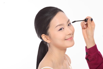 Obraz premium 화장하는 여성 얼굴 클로즈업