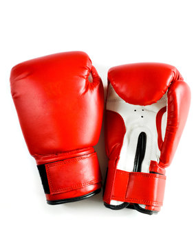 Red boxing gloves on a white background
