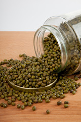 Mung beans in  jar on wood table