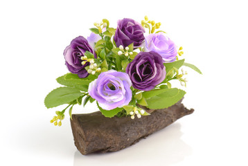 The artificial roses on white background