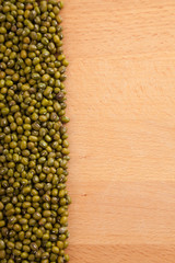 Mung beans on wood table