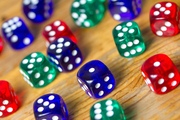 colorful dices background on wood
