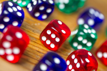 colorful dices background on wood