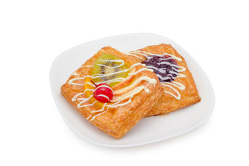 danish pastry with fruits on white background