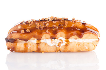 Eclair with caramel decoration