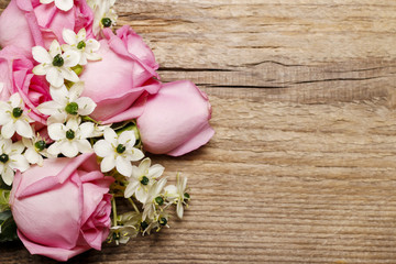 Spring background with pink roses and arabian star flower (ornit