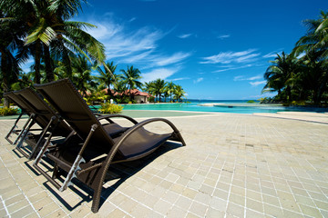 Swimming pool vacation resort with recliner in Boracay