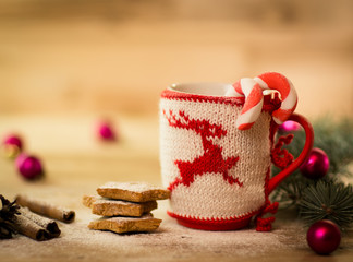 Obraz na płótnie Canvas Christmas mug with decorations and sweets
