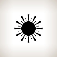 Silhouette sun with rays on a light background
