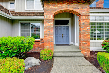 Entrance porch with brick trim