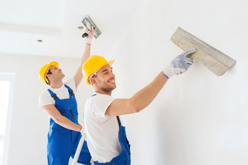 group of builders with tools indoors - obrazy, fototapety, plakaty