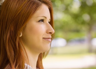 Pretty redhead calm in daydreaming