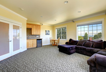 Living room interior with kitchen and dining area