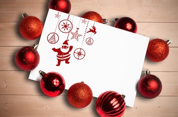 Fototapeta na wymiar Composite image of hanging red christmas decorations