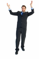 Businessman cheering with hands raised