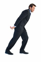 Businessman pulling something behind him