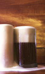 Foamy beer in mugs