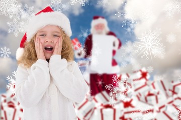Composite image of festive little girl with hands on face