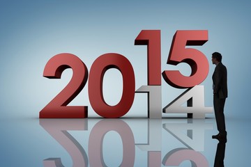 Composite image of businessman standing