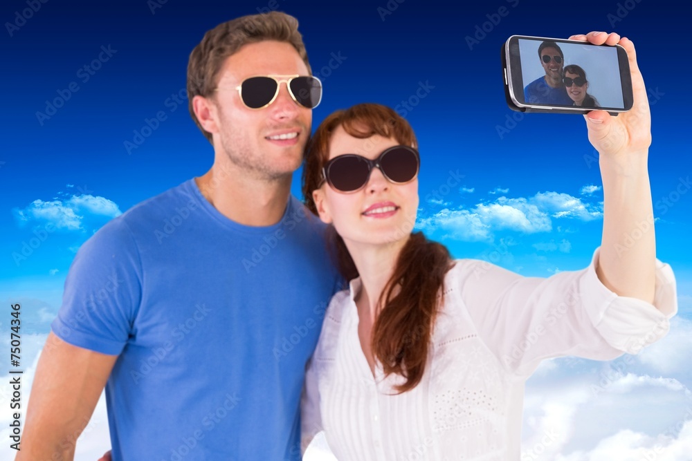 Aufkleber composite image of couple using camera for picture