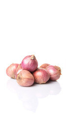 Indian small red onions over white background 