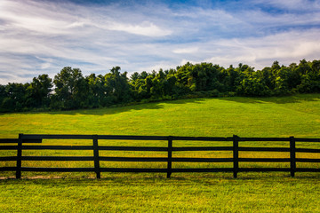 Fence and hill in rural York County, Pennsylvania.