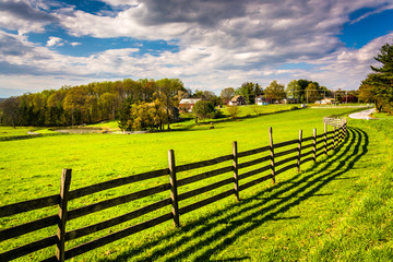 Fototapeta na wymiar Fence in a farm field in rural York County, Pennsylvania.