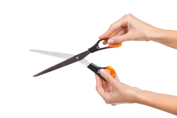 Scissors in woman's hand