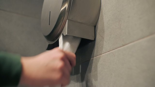 Taking too much toilet paper.