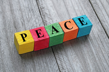 word peace on colorful wooden cubes