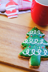 Christmas tree cookie on wood plate
