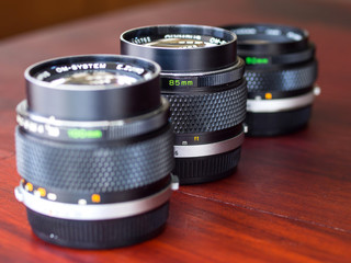 Different OM lenses composed together in natural light