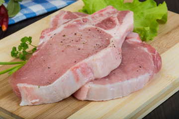 Raw t-bone steak