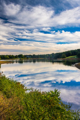 Reflections of clouds in Lake Pahagaco, near Spring Grove, Penns