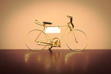 Toy model of the bike, made of gold wire