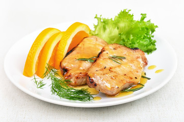 Pork chop with orange sauce