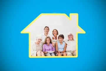 Composite image of multigeneration family on couch watching tv