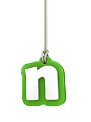 Green lowercase letter N hanging on rope with clipping path