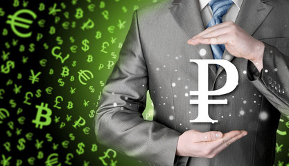 businessman protecting ruble  symbol